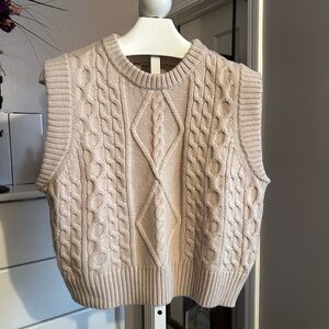 Free Assembly sleeveless sweater.